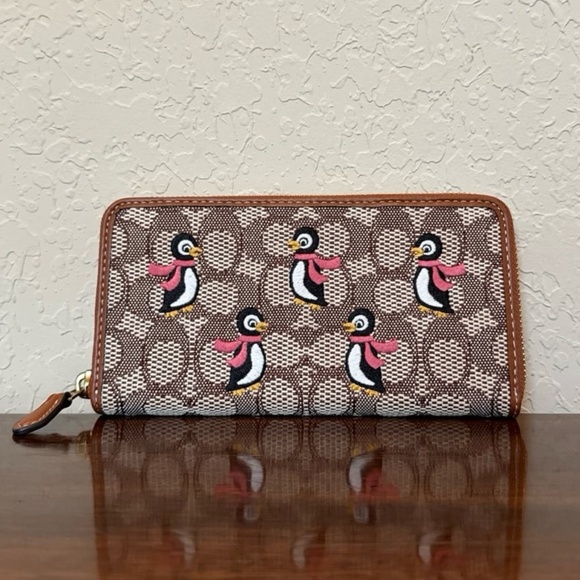 Coach Handbags - Coach Accordion Zip Wallet In Signature Textile Jacquard With Penguin Motif